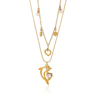 Gold multi-layer necklace with dolphin heart pendant, pearls and stars for women fashion jewelry.