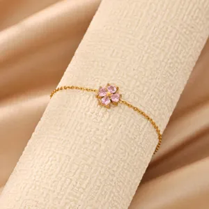 Charming 18k gold plated stainless steel pink cubic zirconia four leaf clover bracelet jewelry.