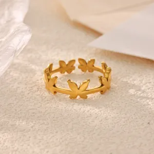 Close-up of the 18k gold plated stainless steel butterfly ring, showcasing delicate details.