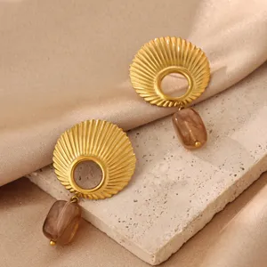 Vintage shell texture stainless steel earrings with amber resin drops for women fashion.