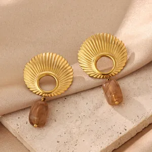 Stunning shell textured fan-shaped drop earrings featuring stylish retro amber resin pendants.
