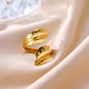 Close-up detail of the 18K gold plated stainless steel geometric leaf open ring for women.