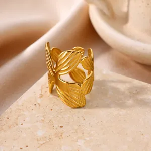 Stainless steel 18k gold plated open ring featuring an elegant geometric leaf cutout detail.