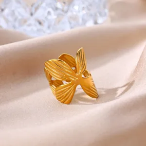 Detail shot of the gold plated stainless steel leaf ring, highlighting texture and open design.