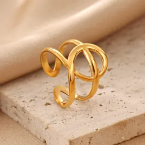 Gold-plated stainless steel open geometric ring, multi-strand hollow design, elegant jewelry.