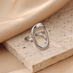 Detailed close-up view showcasing the modern minimalist irregular hollow oval silver metal ring.