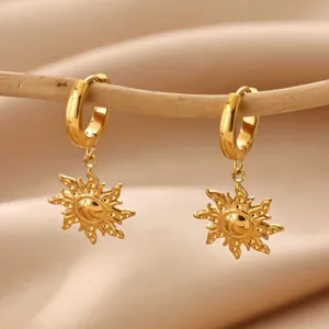 Exquisite gold plated stainless steel sun drop earrings, elegant detailed design.