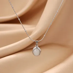 Minimalist luxury oval titanium steel necklace with cat eye pendant for elegant wear.