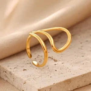 Close-up detail shot of minimalist hollow geometric open ring in 18k gold plated stainless steel.