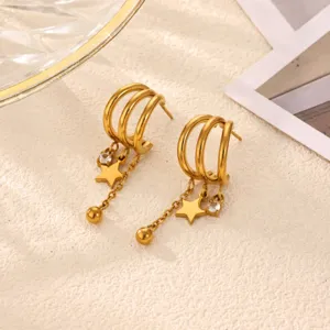 Gold stainless steel multi-layer hoop earrings featuring delicate star and bead hanging chains.
