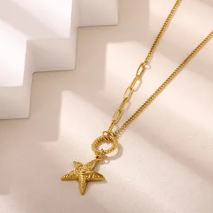 Exquisite gold pendant necklace detail, featuring a textured star charm and mixed chains for women.