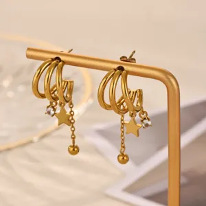 Exquisite 18k gold plated multi-layer hoop earrings with cute star and ball pendants for women.