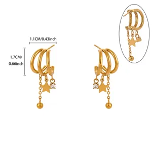 Gold multi-layer hoop earrings with dangling star charms and zircon details, chic jewelry.