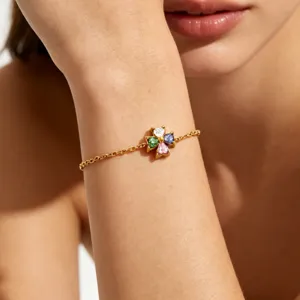 Chic 18K gold plated stainless steel bracelet with multicolored stone clover pendant.
