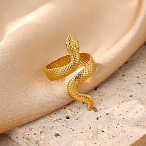 Gold snake ring detail, minimalist stainless steel 18k gold plated open finger jewelry.