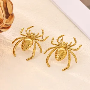 Gold spider stud earrings for women, unique animal design metallic fashion jewelry accessories.
