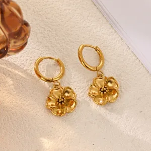 Gold flower drop earrings for women, trendy chic metal huggie hoop jewelry for daily wear.