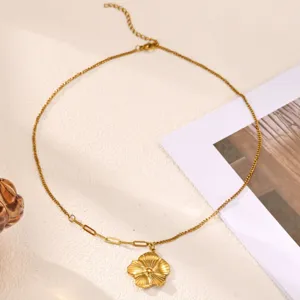 Gold stainless steel flower pendant necklace for women, elegant fashion jewelry accessory.