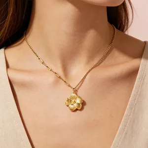 Gold flower pendant necklace crafted from stainless steel with 18k gold plating detail