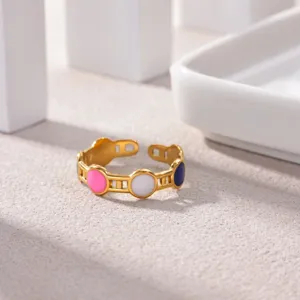 Stainless steel gold-plated open ring featuring colorful enamel dot accents for women.