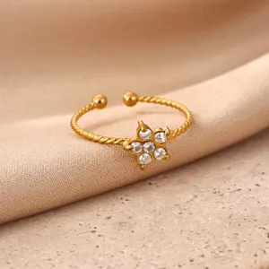 Close-up detail of the 18K gold plated stainless steel open ring with sparkling cubic zirconia.