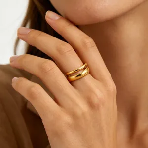 Minimalist double band ring detail, elegant 18k gold plated stainless steel finger jewelry.