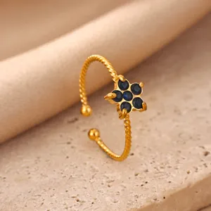 Gold plated stainless steel open ring featuring a sparkling blue zircon flower detail stylish.