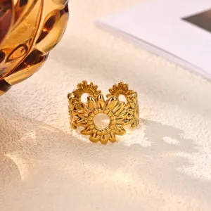 Detailed shot of a stylish 18K gold plated stainless steel sunflower open ring for daily women wear.