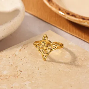 Gold plated stainless steel Celtic knot open ring detail shot, minimalist jewelry.