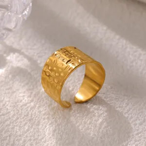 Minimalist 18k gold plated stainless steel open ring with unique hammered textured detail.