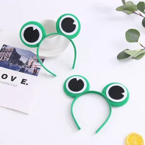 Schattige groene kikker haarband met grote ogen voor kinderfeestjes en toneelvoorstellingen.