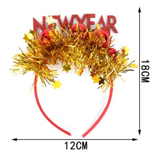 Details of the New Year party headband featuring gold tinsel, red stars and sparkling text.