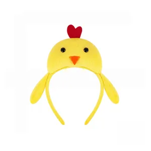 Détail serre-tête poussin peluche, tissu jaune doux avec cœur rouge, accessoire de fête mignon.