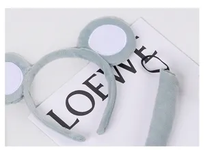 Cute plush animal ears headband and tail set in soft blue and white for fun party cosplay.