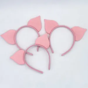 Detail shot of cute pink animal ear headbands set, soft plush fabric, perfect party costume.