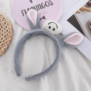 Joli serre-tête d'oreilles de cheval en peluche grise avec visage souriant, bandeau doux