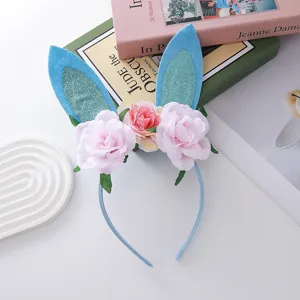 Cute Easter bunny ear headband with glitter and charming pink floral decorations for kids party.