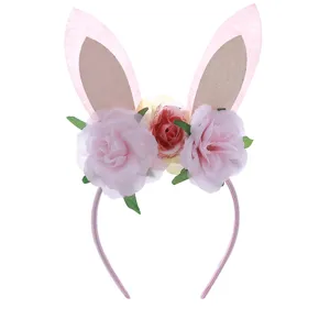 Easter bunny ear flower headband for kids party, cute pink floral hair hoop accessory.