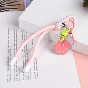 Pink woven lanyard strap keychain phone charm cute smiley face phone case accessory