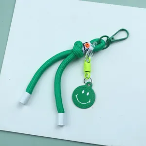 Green braided phone lanyard keychain wrist strap with smiley face charm cute accessory