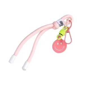 Pink woven phone lanyard strap short keychain with cute smiley face pendant charm bag decor