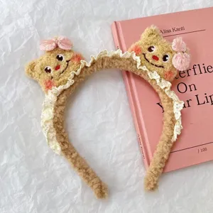 Cute plush bear headband with sweet lace trim and pink bows, perfect for daily wear.