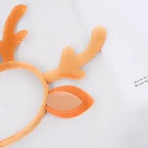 Carino cerchietto con corna di renna in peluche di Natale accessorio per festa.
