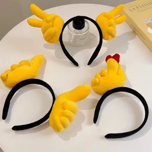 Cute plush gesture headband detail showing funny scissor hand and finger heart design.