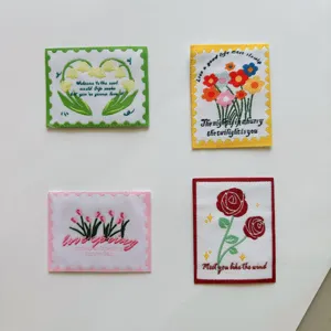 Floral stamp embroidered woven labels DIY patches for clothing bags shoes and accessories decoration.