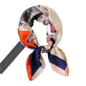 Detailed view of a retro geometric silk scarf featuring elegant color blocking and chic horse print.