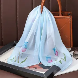 Light blue chiffon square scarf with elegant tulip print, soft versatile neckerchief for women.