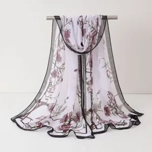 Écharpe longue en mousseline à imprimé floral pour femme, accessoire de printemps.