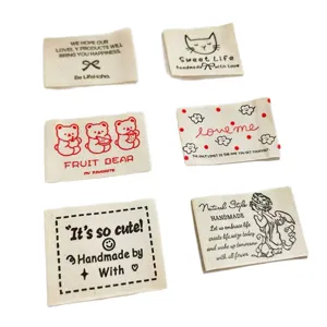 Lot d'étiquettes en coton pur, étiquettes de couture faites main pour vêtements et sacs.