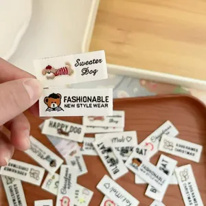 Cute embroidered animal woven labels for clothing, bags, and hats. High-density decorative patches.